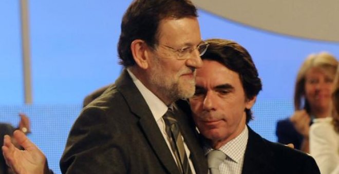 El "cierre de filas" del PP le lleva a presumir de los legados de Fraga y Aznar